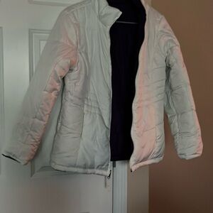 Reversible winter coat.. excellent condition.  Pockets on both sides
